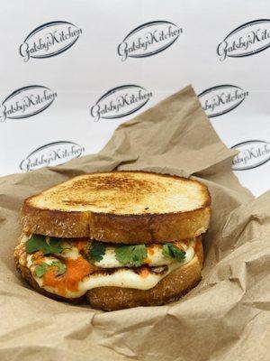 Big Cheese - Melted Mozzarella, Queso Fresco, Romesco sauce and parsley on sourdough