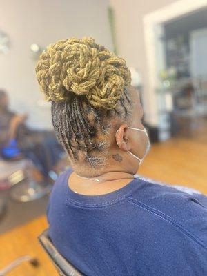 Loc retwist and updo style