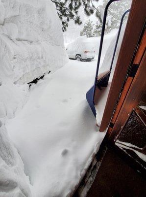 view of the snow depth from the front door . . .    color me tired today . . .