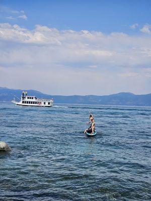 Tahoe Gal passing by the girls, on her way back to Tahoe City.