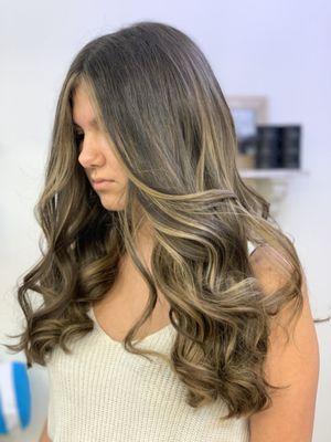 Beautifully blended balayage. Natural and low maintenance highlights to accentuate and open up the face.