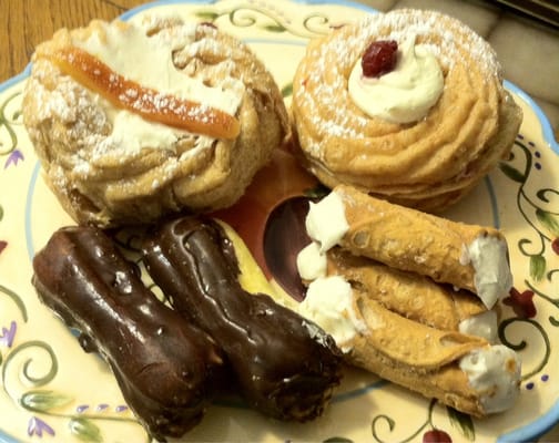 The best pastries! Pictured here are the eclairs, freshly made cannoli's and St. Joseph pastries!