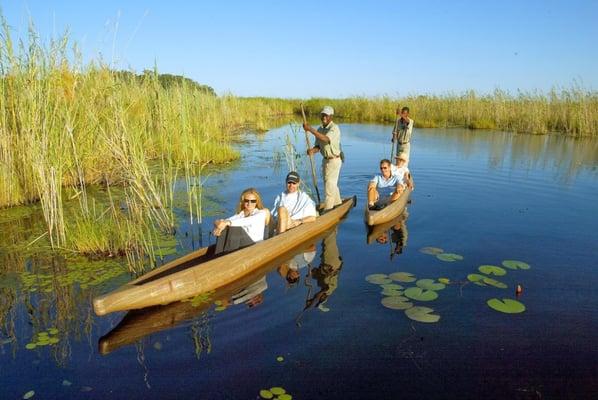 A unique way to see the Okavango Delta of Botswana is by mokoro (wooden dugout canoe).