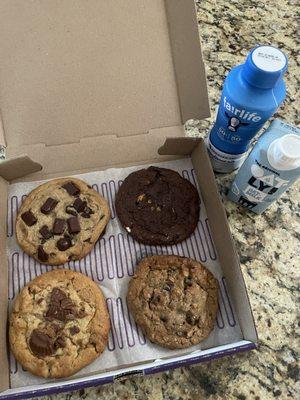 From top left clockwise: Triple Chocolate, S'mores, Oatmeal Chocolate Walnut, Chocolate Peanut Butter Cup (all deluxe)