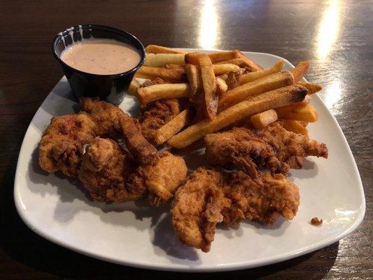 These are chicken tenders with fries and their loco's sauce. The picture probably give this meal better appeal.