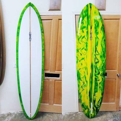 Nice 7'6" Glider single fin with resin abstract tint!