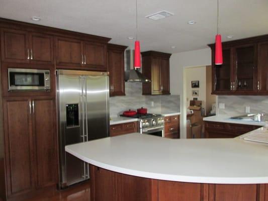 Beautiful cherry wood cabinets refinished by Remarkable Refinishing.