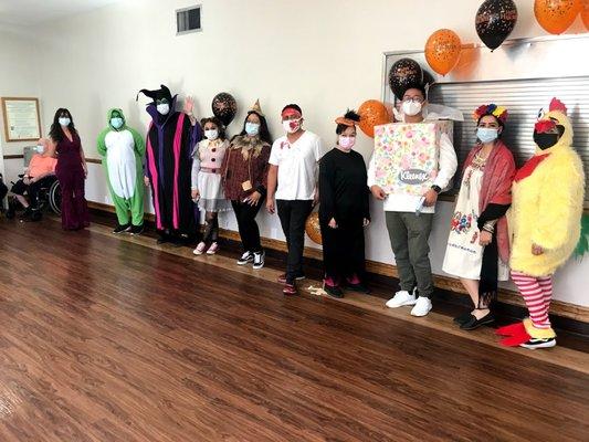 staff participating for halloween while continuing to stay safe and wear a mask