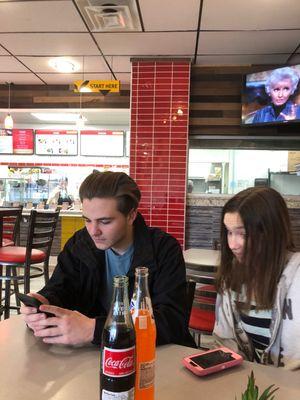 My kids and I waiting for some yummy tacos.