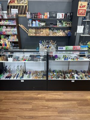 Smoke shop, ash trays, raw hats, glass water pipes, silicon pipes, gas masks, one hitters, torch lighters, glass rigs, terp slurpers, etc!