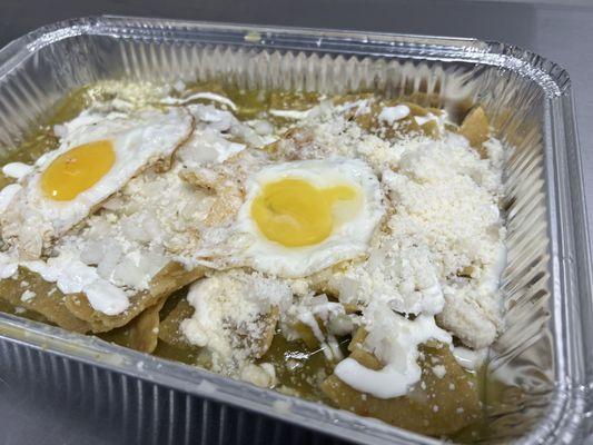 Green Chilaquiles
with 2 over easy eggs on top