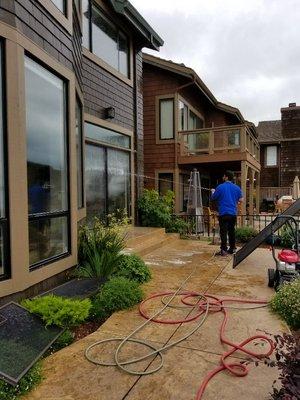 Soap before pressure washing.