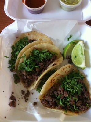 Fajita tacos with refried beans and cilantro