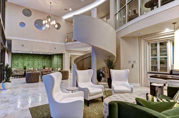 Eberson Lavish Living Room with Spiral Stairs