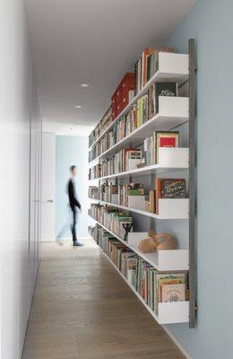 Atlas AS4 modular hallway library in white opaque lacquer and cold-rolled steel