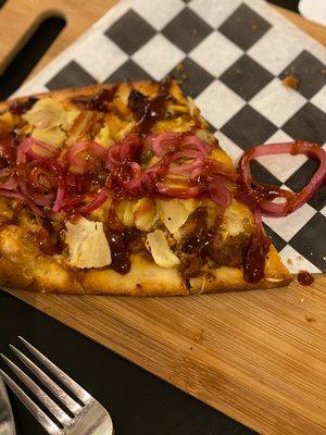 BBQ pulled pork flatbread with pineapple and pickled red onion