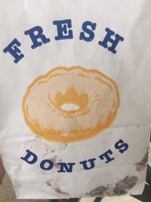 Donuts got stuck to the bag.  Really? No wax paper or even a small box for five donuts? Disappointing.