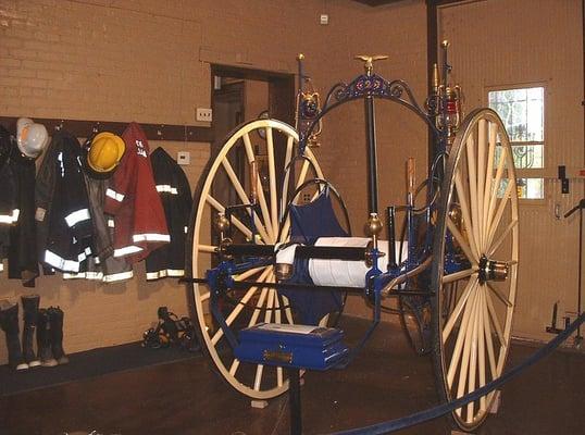 A horse-drawn hose cart