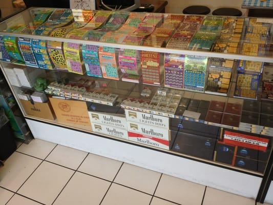 Large selection of CA Lotto scratchers. $1-$10, plus lotto services: Mega Millions, Super Lotto, Powerball, Fantasy 5, etc