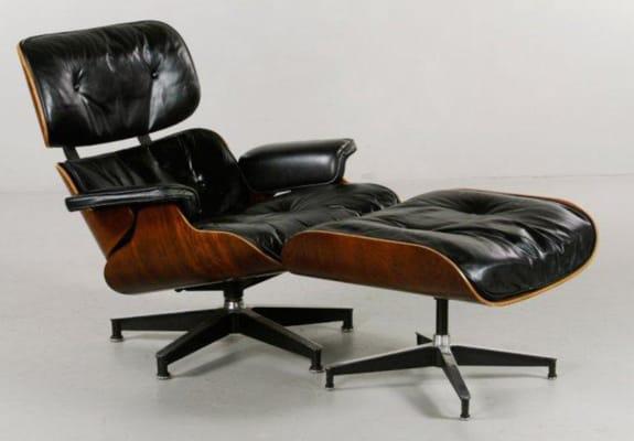 Charles and Ray Eames for Herman Miller chair and ottoman, rosewood and black leather