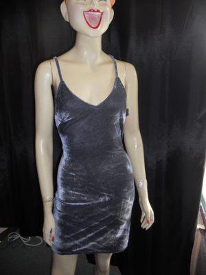 Gray velvet form fitting club dress.