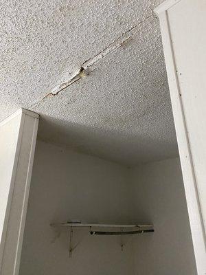 Cracked paint and ceiling through the whole room