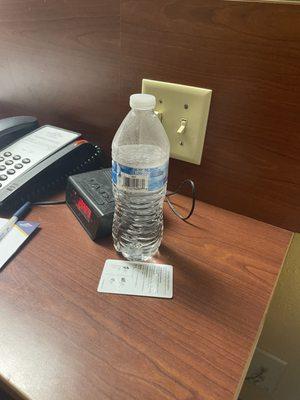 Half empty water and room key still on the nightstand when we very first entered the room