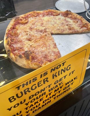 The Sign and a cheese pizza for slices