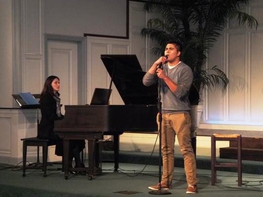 One of our teachers accompanying her voice student at our semi-annual recital.