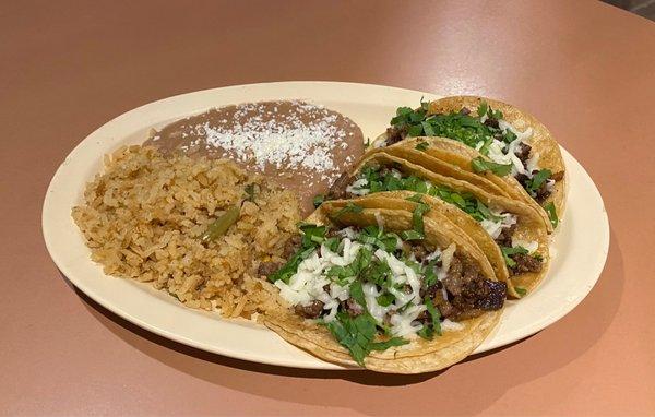 Steak tacos with rice and beans