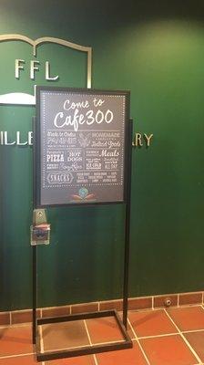 Sign for the cafe at the library entrance