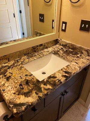 Guest bathroom countertop with under mount sink