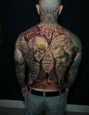 Full back realistic tattoo