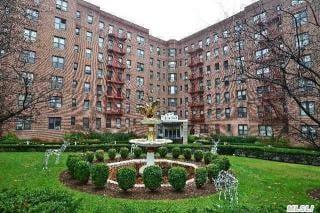 The beautiful gardens at the entrance of the Eden Rock Cooperative Apartments in Briarwood Queens