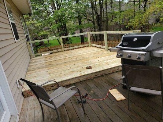 Deck extension minus completed railing.