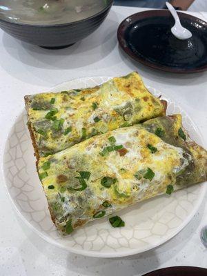 Jianbing guozi (煎饼果子) or egg pancake with a fried dough stick according to the menu