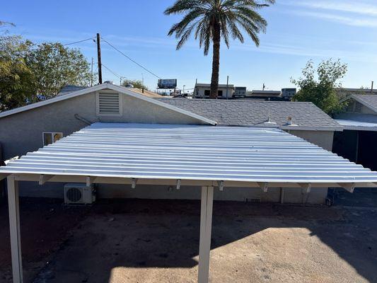 Needed the roofs of the carports painted.