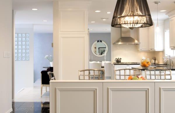 Classic White Kitchen Cabinets with Dramatic Black counter tops