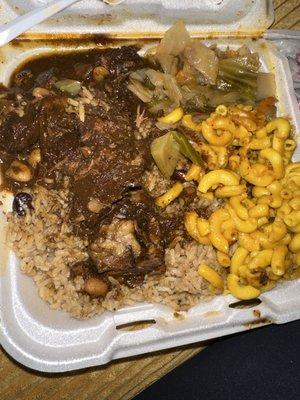 "Oxtails" with Mac and "cheese" , cabbage and rice and peas