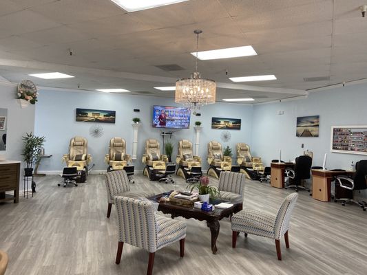 Clean mani and pedi stations with waiting area.