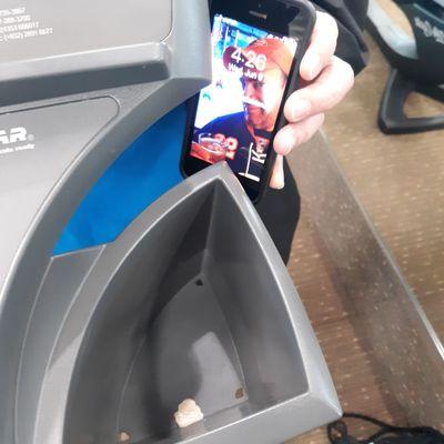 Photo of the gum in the water bottle well of this machine. I first noticed it in April.