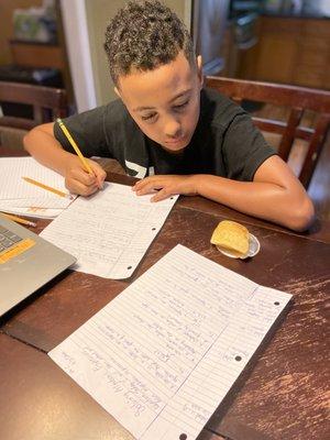 Viewed here: Scholar Elijah uses Cornell Note Style of taking notes helps to better organize his thoughts.