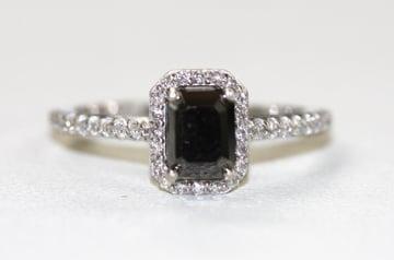 Black & White Diamond Engagement Ring in 14K White Gold.  Center diamond is an emerald cut Black Diamond weighing 1.17 ct.