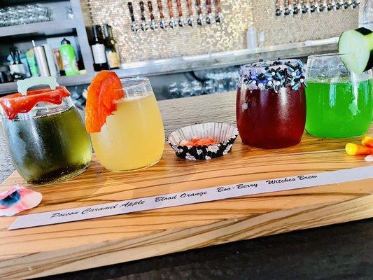 Their new October mimosa flight.. it's spook-tacular!!