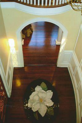 Custom Hardwood installation, with flower pattern inlay.