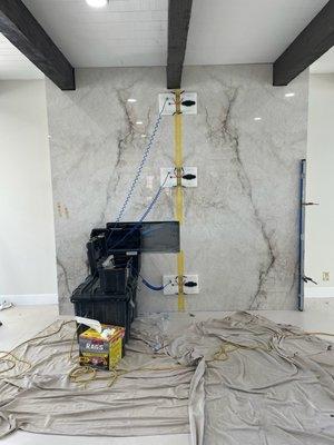 Fireplace Porcelain slab installation.