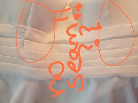 Picture where the seam is missing  on one side under the breast area