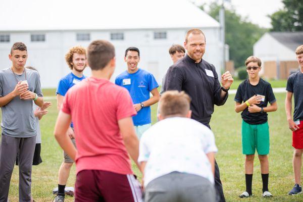 Religious brother with the kids program