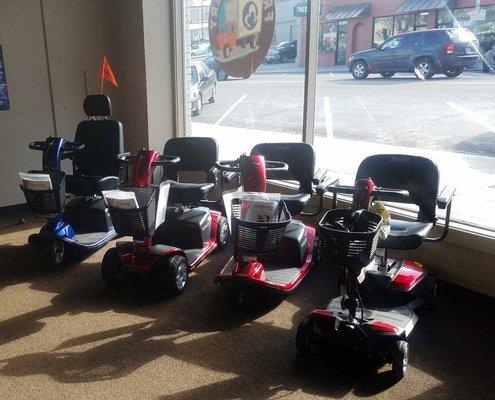 Power chairs and mobility scoots in stock and ready for demo.