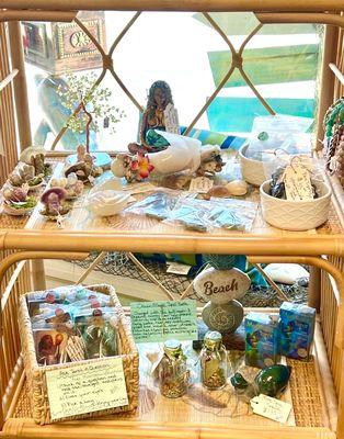 Handmade mini crystal buddah s inside a shell,mermaid Tarot cards, Goddess statues, spell bottles , crystal bracelets with turtle charms.